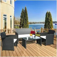 Costway 4 PCS Outdoor Rattan Wicker Furniure Set Coffee Table W/ Black Cushions