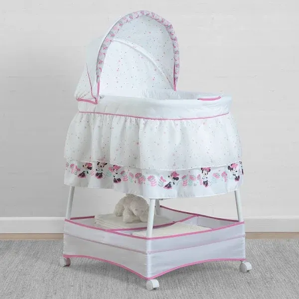 Delta Children Gliding Bedside Bassinet - Portable Crib with Lights, Sounds and Vibration, Disney Minnie Mouse Boutique