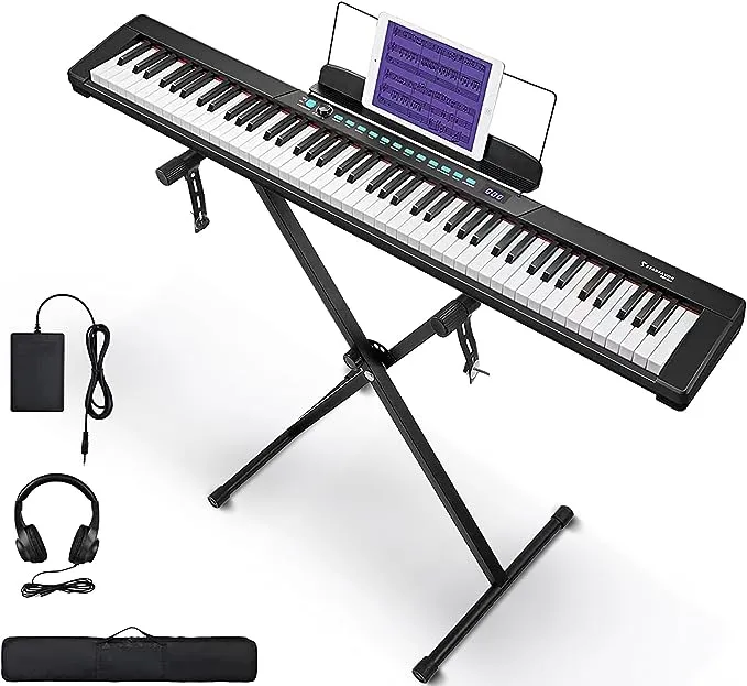 88 Key Starfavor Piano Keyboard with stand, pedal, and case